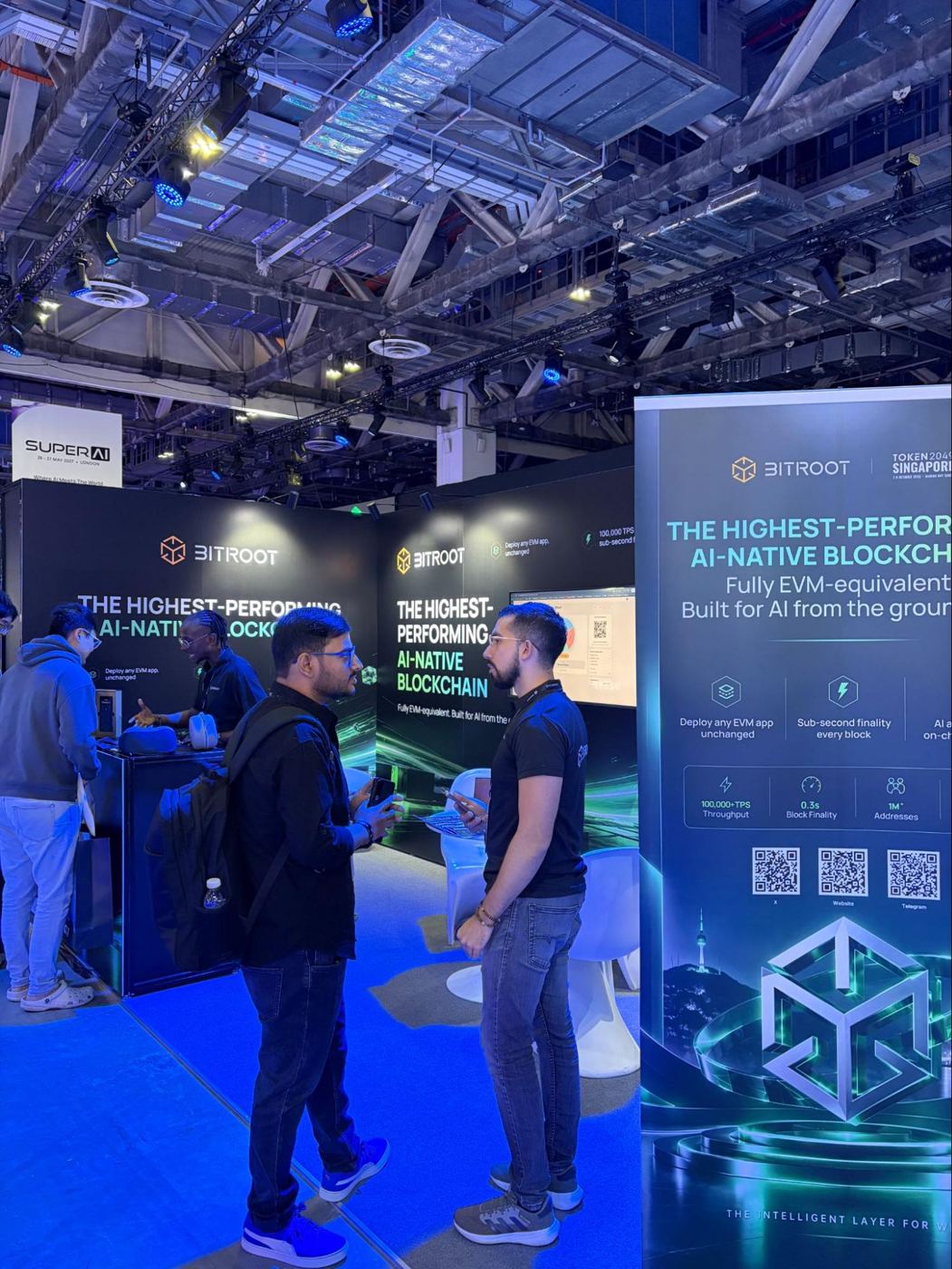 Conversations in front of the Bitroot booth